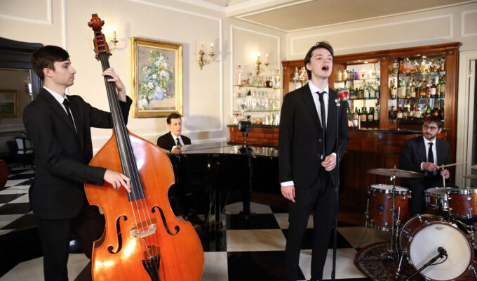 Italian male jazz singer and his band at the Imperiale Palace Hotel's American Bar